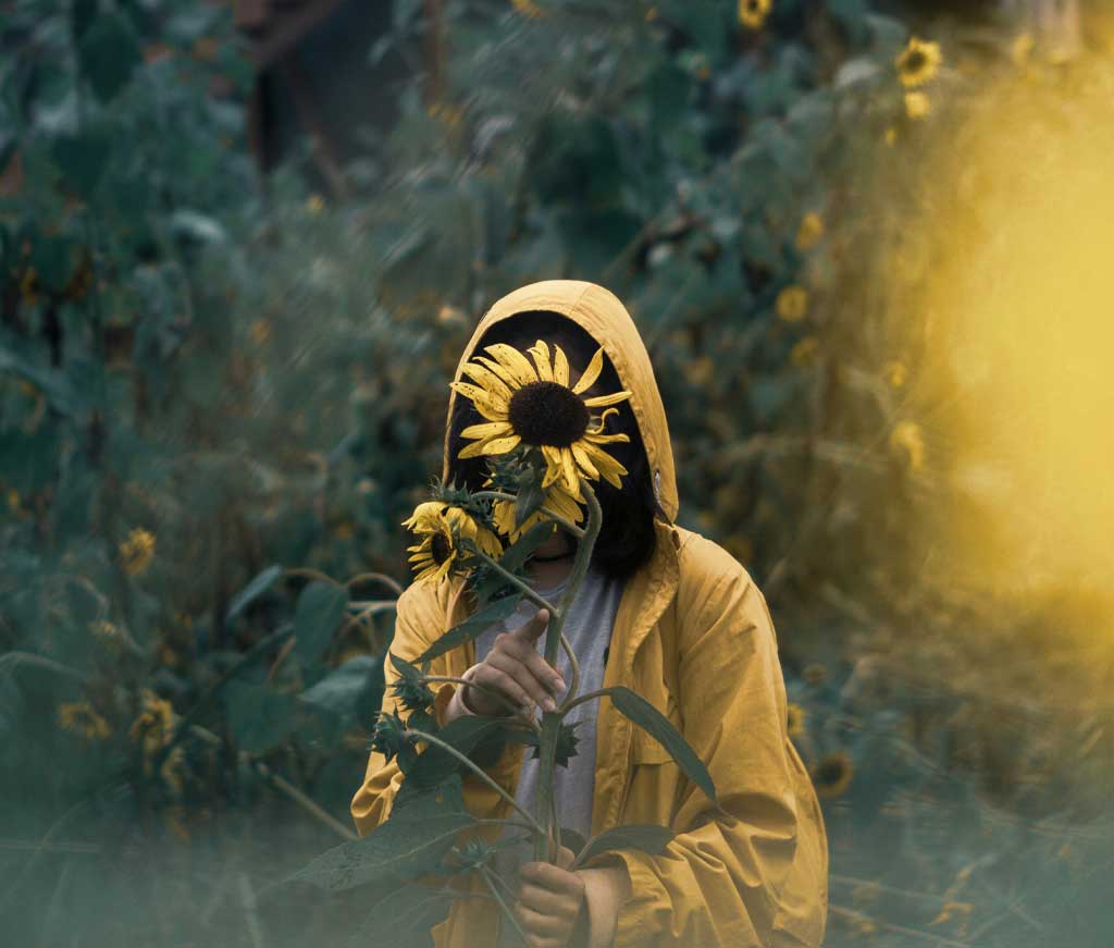 Conceptual image representing imposter syndrome, showing a person partially obscured, symbolising self-doubt and lack of confidence